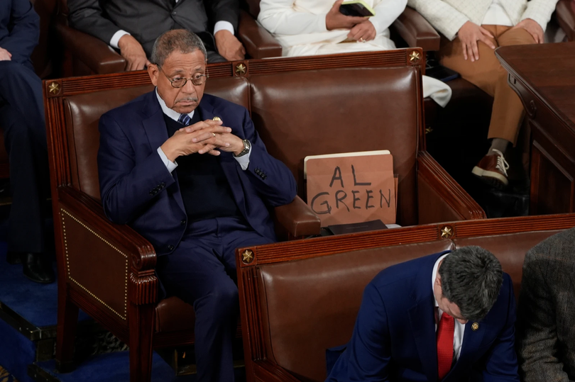 Rep. Al Green leaves sign at empty seat after he's escorted out of SOTU