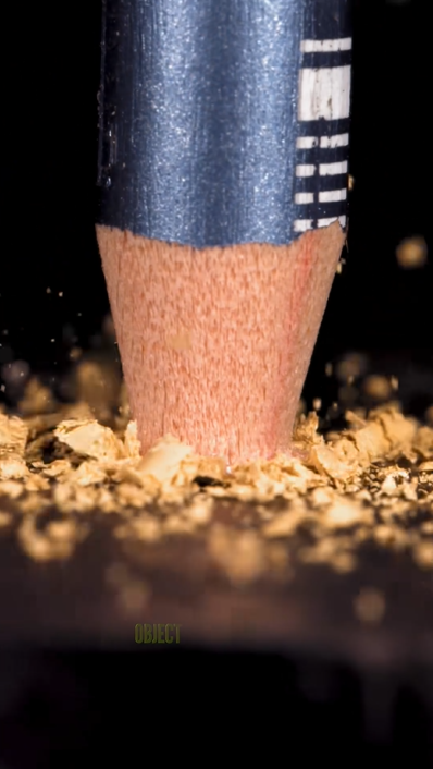 Pencil impact in extreme slow motion close up