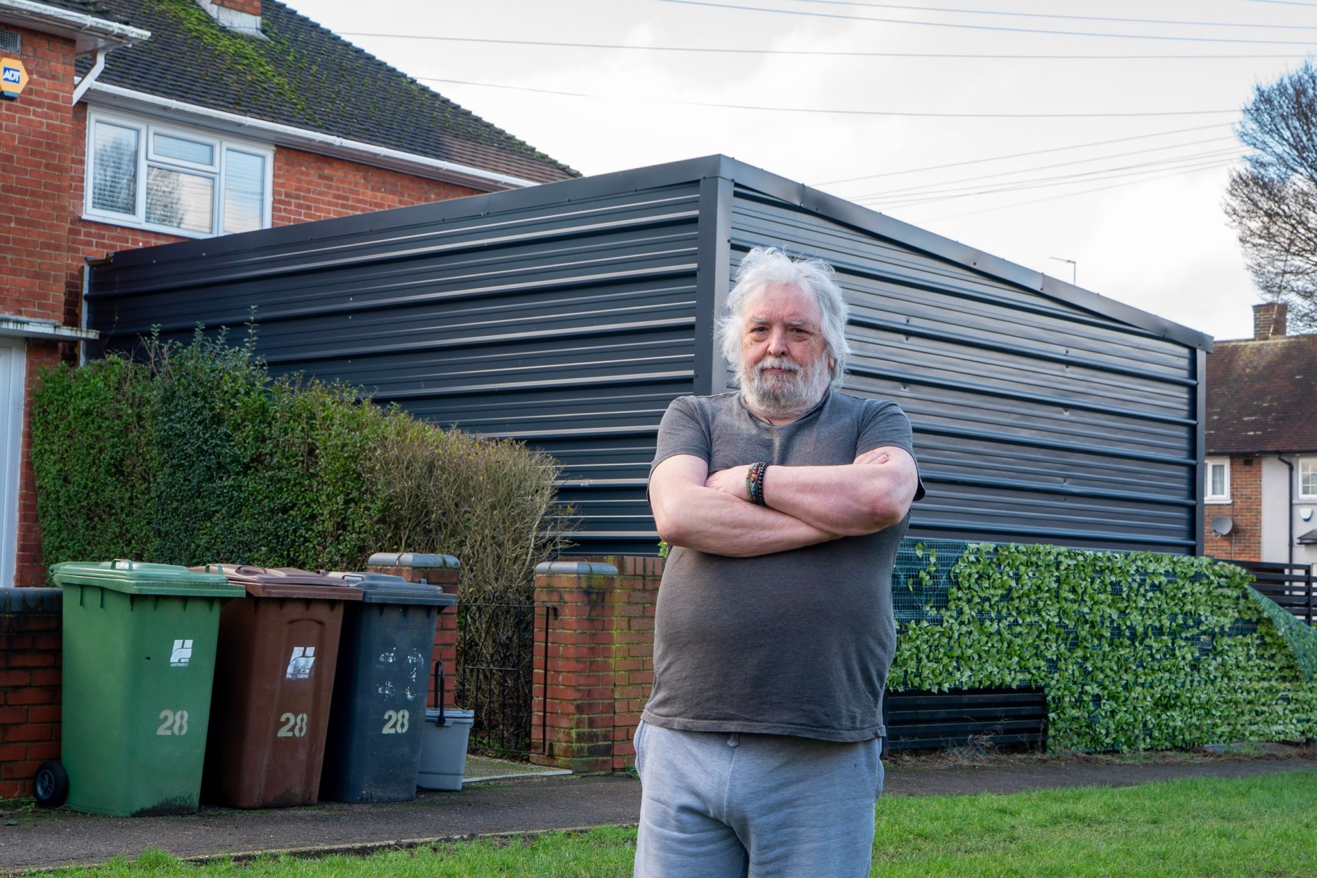 Businessman refuses to pull down mega-garage he built without permission