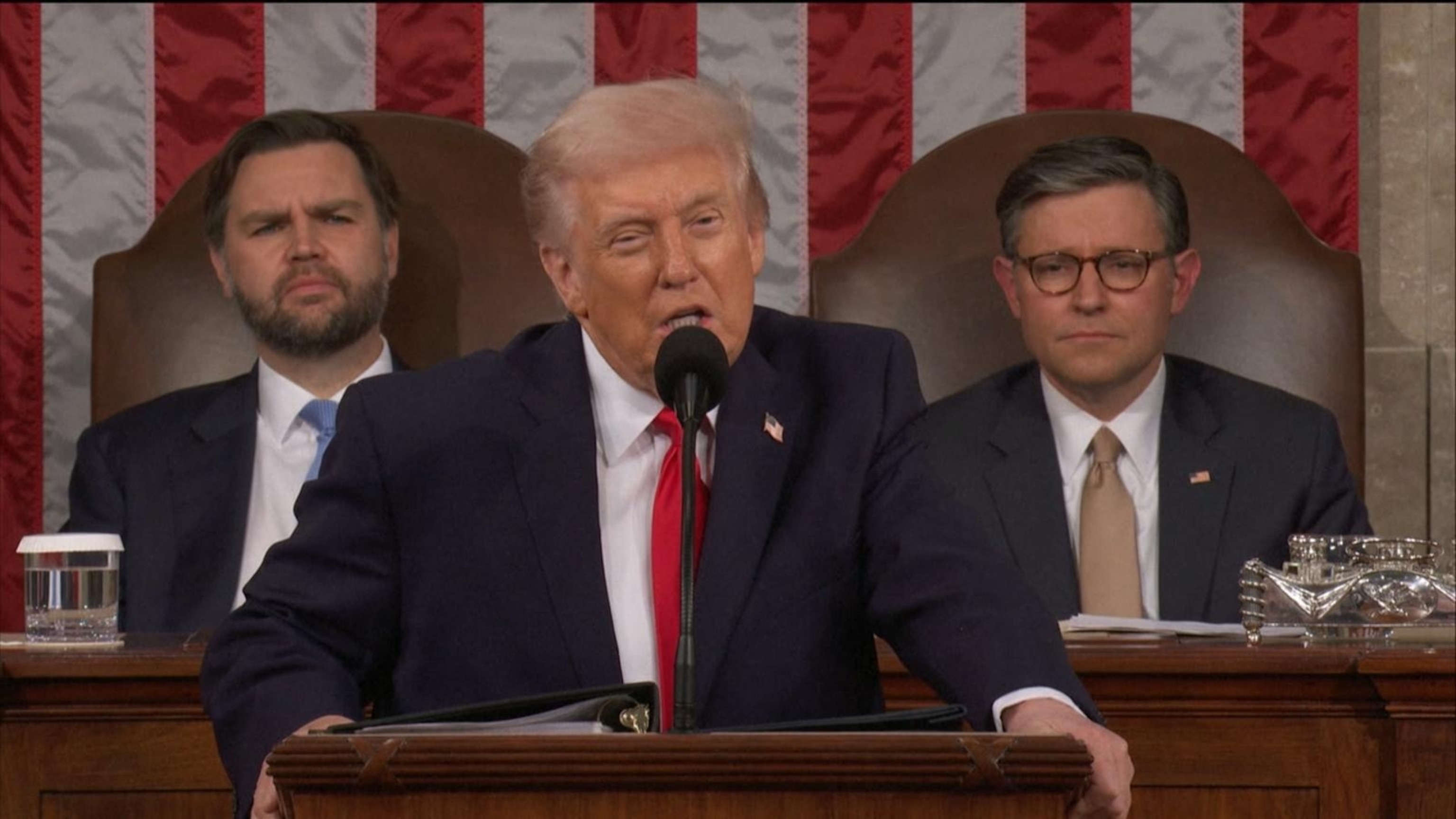 Trump spars with Dems, touts economy in record State of the Union