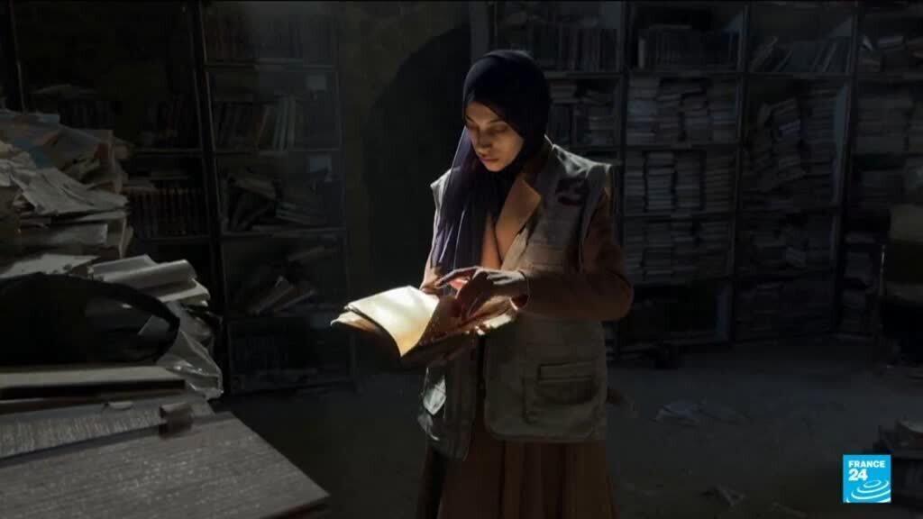 Gazans battle to salvage ancient books in war-ravaged mosque library