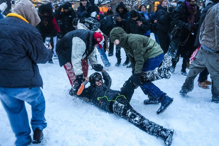 Cops rushed to hospital after being injured when they were pelted with ...