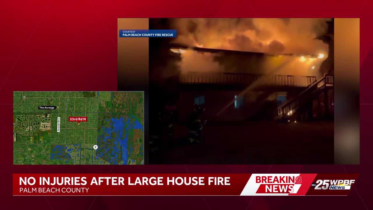 Massive fire erupts in Palm Beach County home