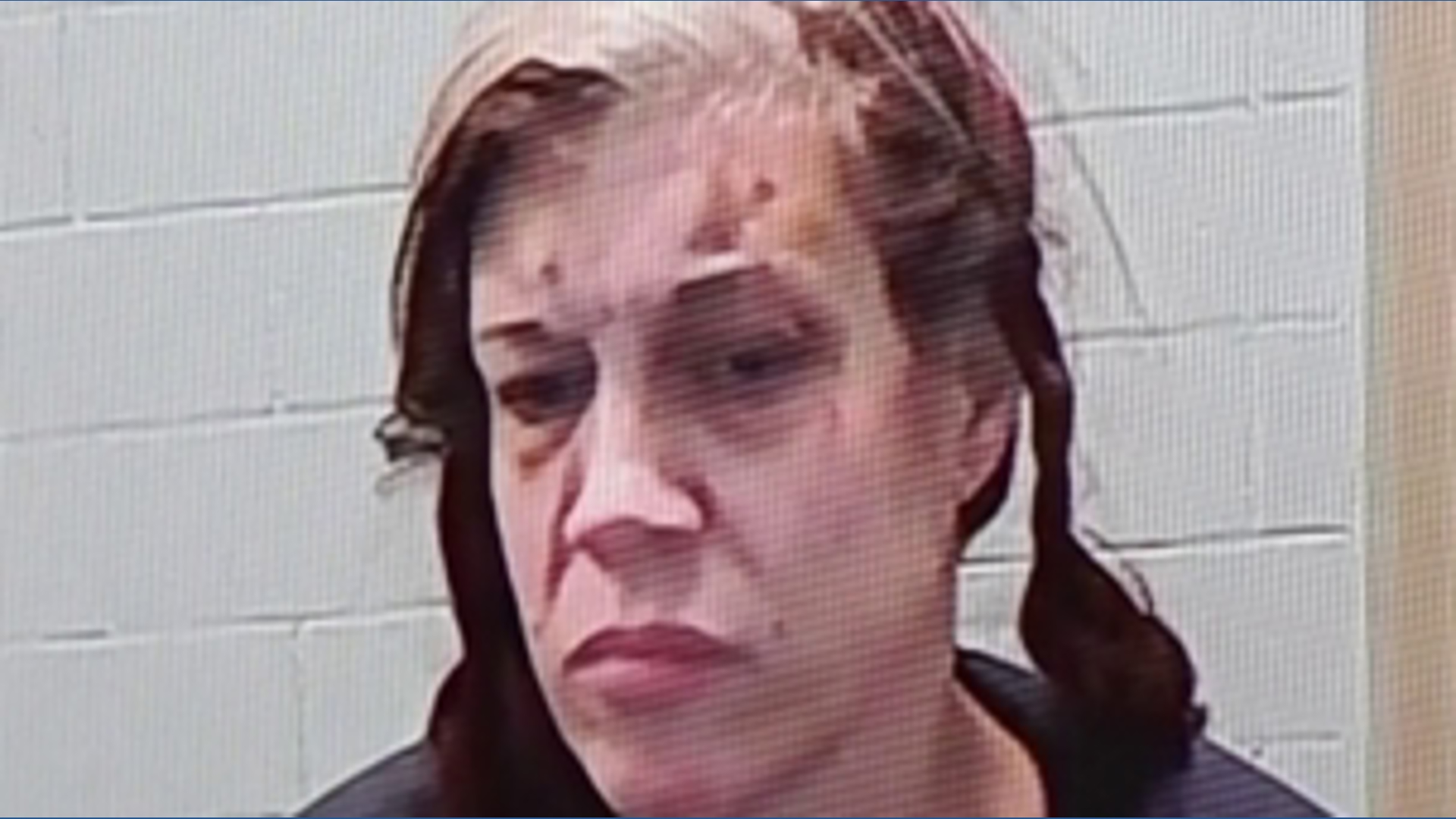Woman charged in stabbing of pregnant woman, 2 others in Holton bar