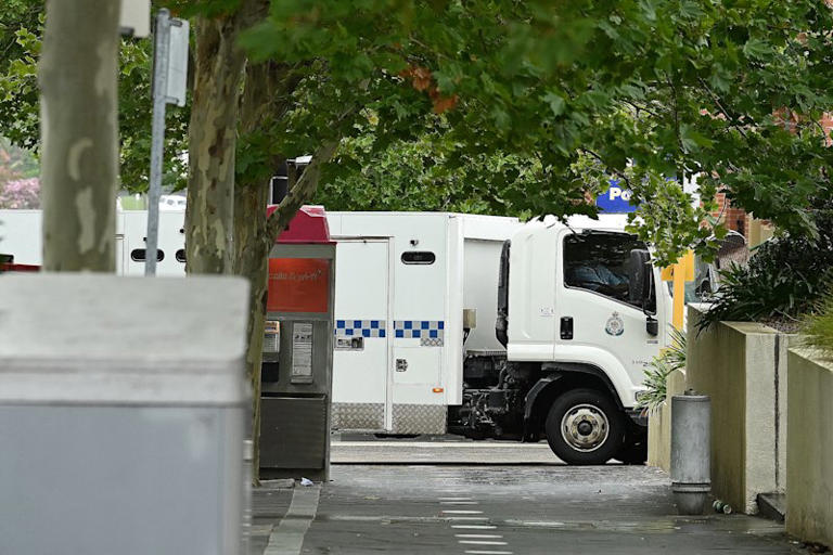 A corrective services prison truck arrives at Blacktown court on Thursday morning.