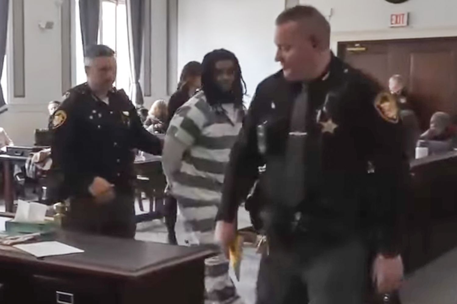 Courtroom fight breaks out after man receives reduced sentence in ...