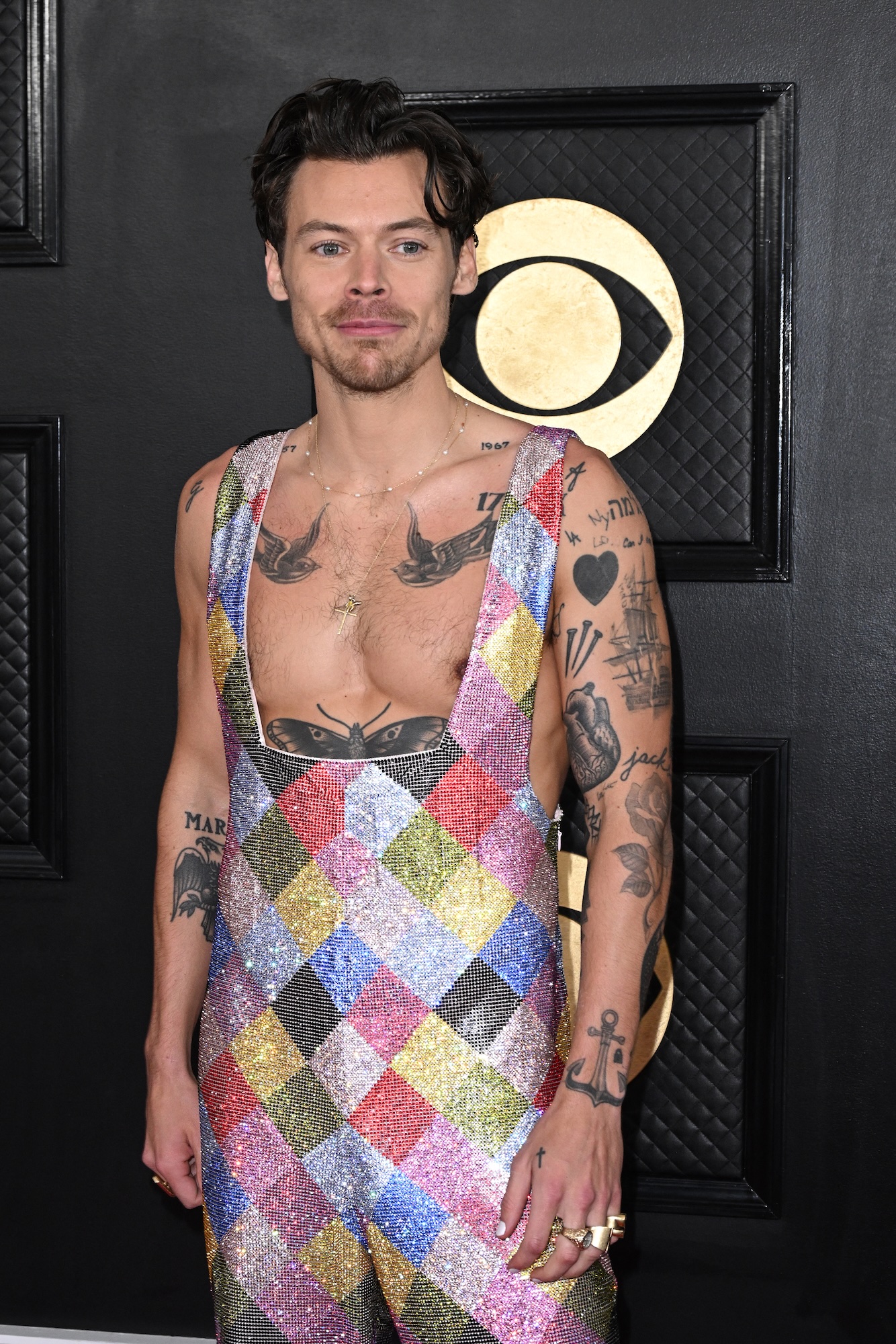 Harry Styles addresses rumor that his hairline and teeth are ‘fake’