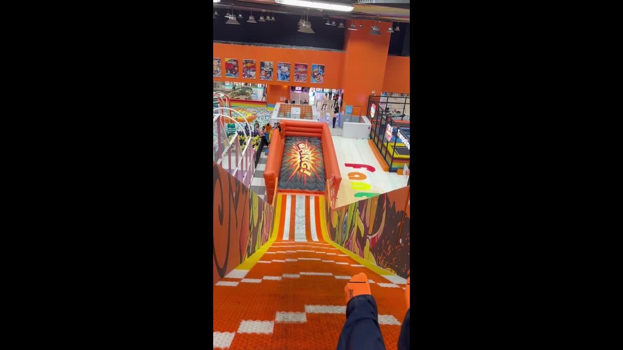 Slide goes hilariously wrong as ring flies out of the landing zone