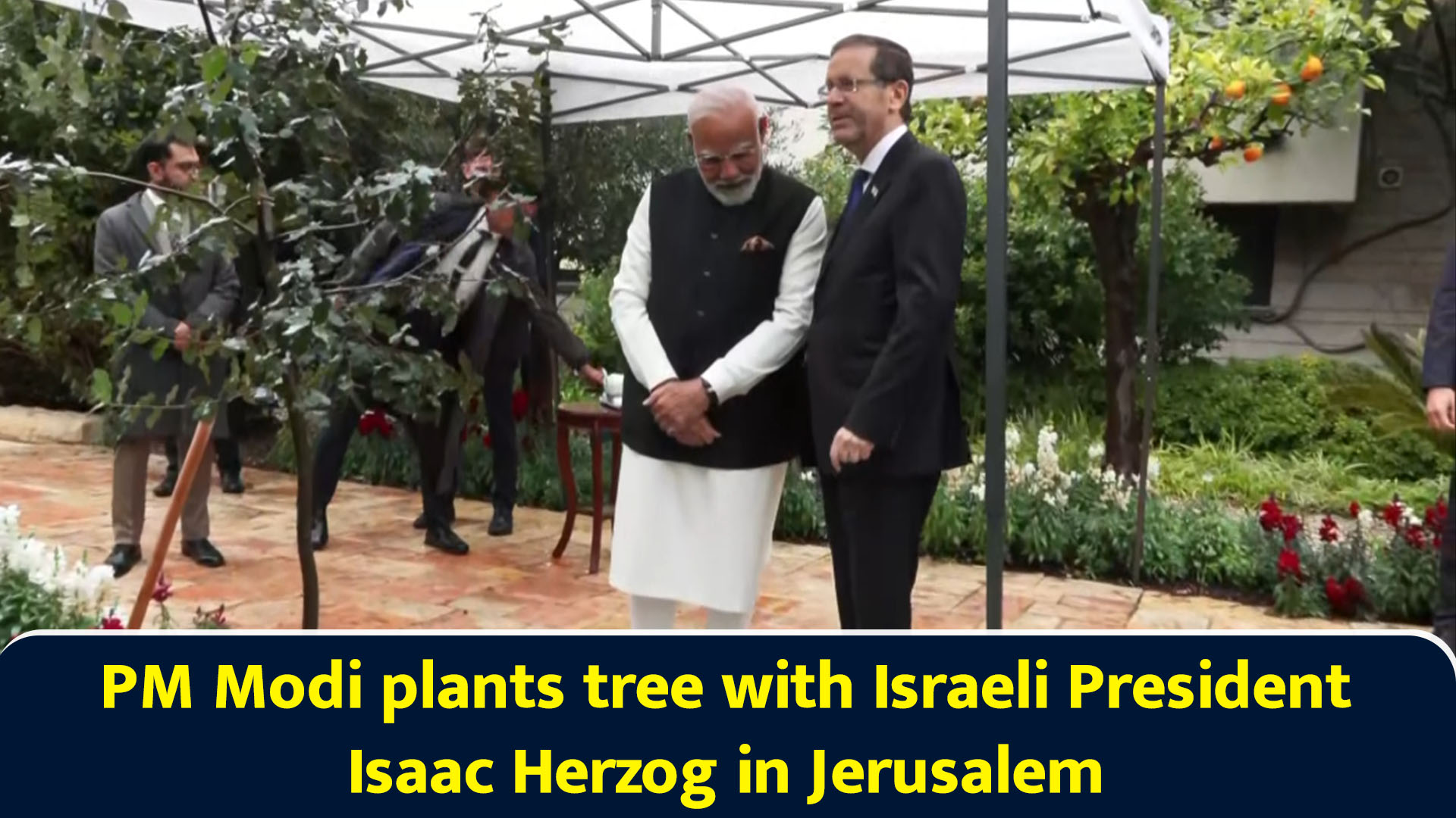 PM Modi plants tree with Israeli President Isaac Herzog in Jerusalem