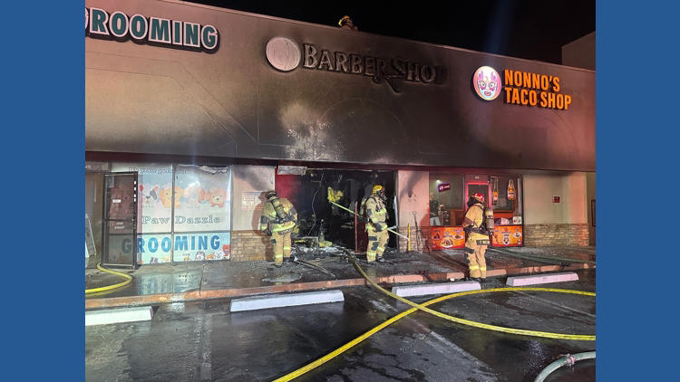 Man arrested after a suspected arson at a Phoenix barber shop