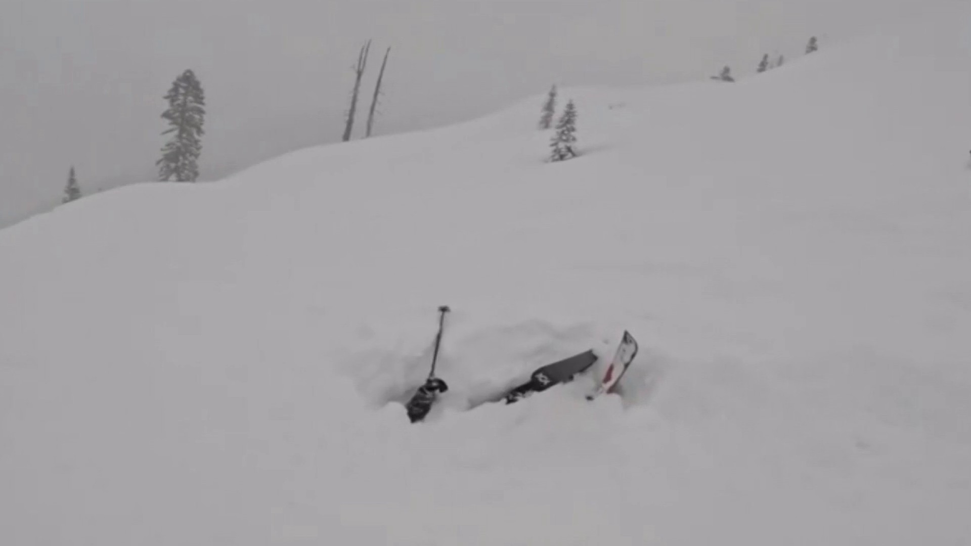 Skiers rescue man trapped in snow