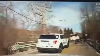 Wild chase sees police SUV end up on the back of flatbed trailer being ...