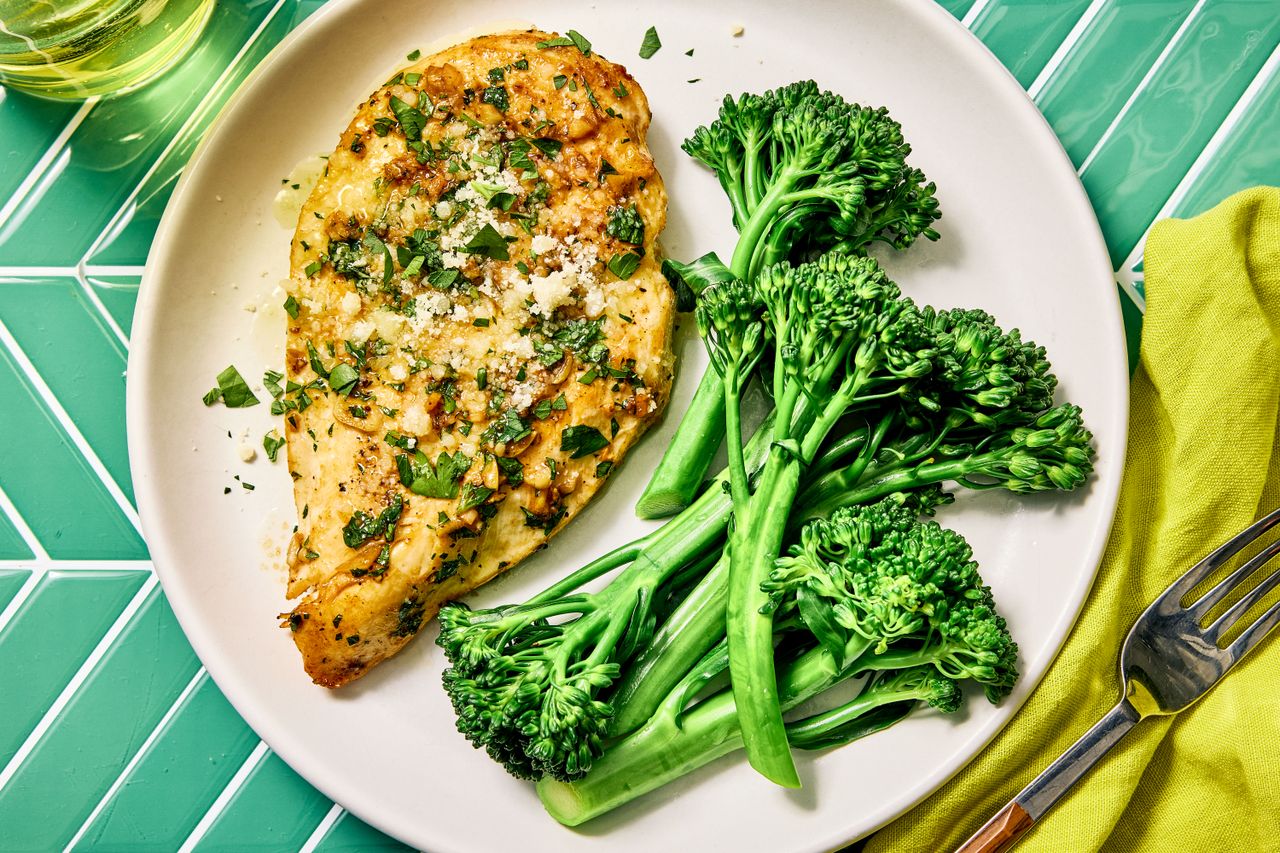 Southern Living Garlic Knot Chicken on a plate to serve with broccolini