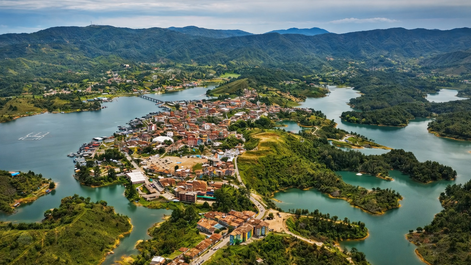 Guatapé town surrounded by the emerald lakes of Colombia