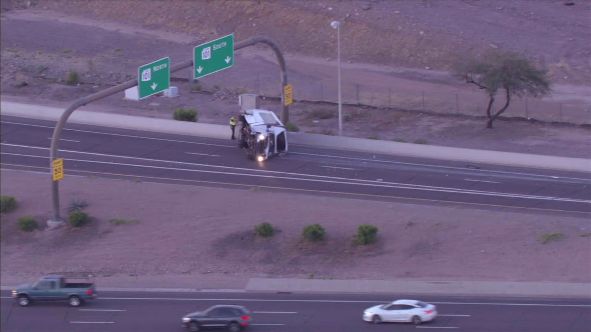 Crash involving a rolled-over semi-truck occurs along eastbound Loop ...