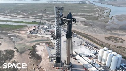 SpaceX stacking Starship 24 onto heavy booster in amazing drone video