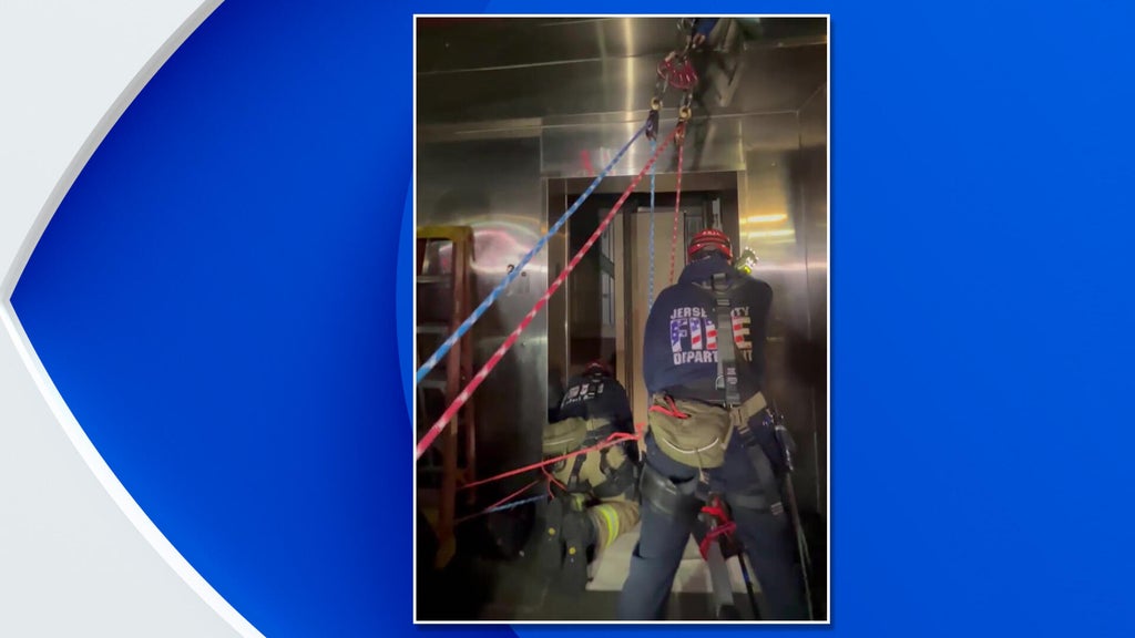 Jersey City firefighters save 2 teen girls from stuck elevator by ...