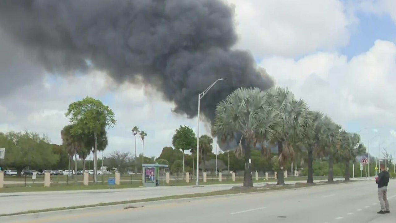 Fire at northwest Miami-Dade warehouse continues to rage as crews from ...