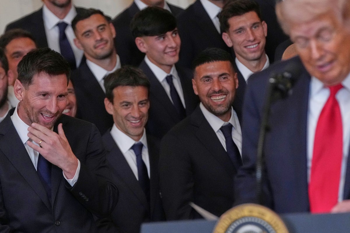 Trump boasts of 'total demolition' of Iran as Messi stands behind him