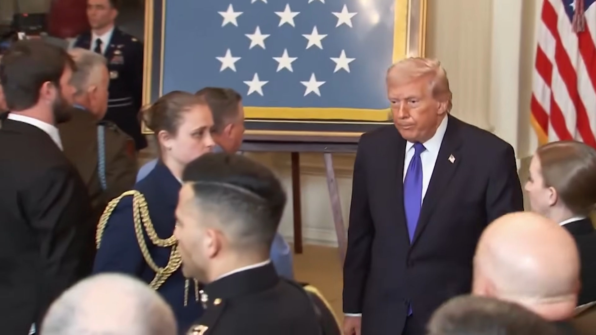 Confused Trump walks away from speech as press shout at him