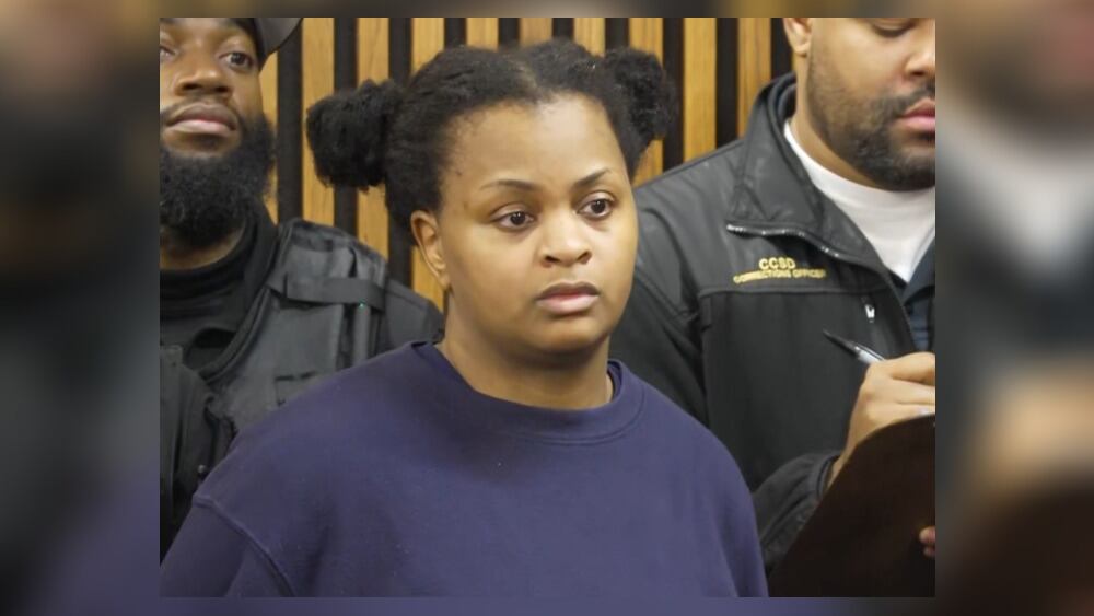 Mother of 2 girls found dead in suitcases appears in court