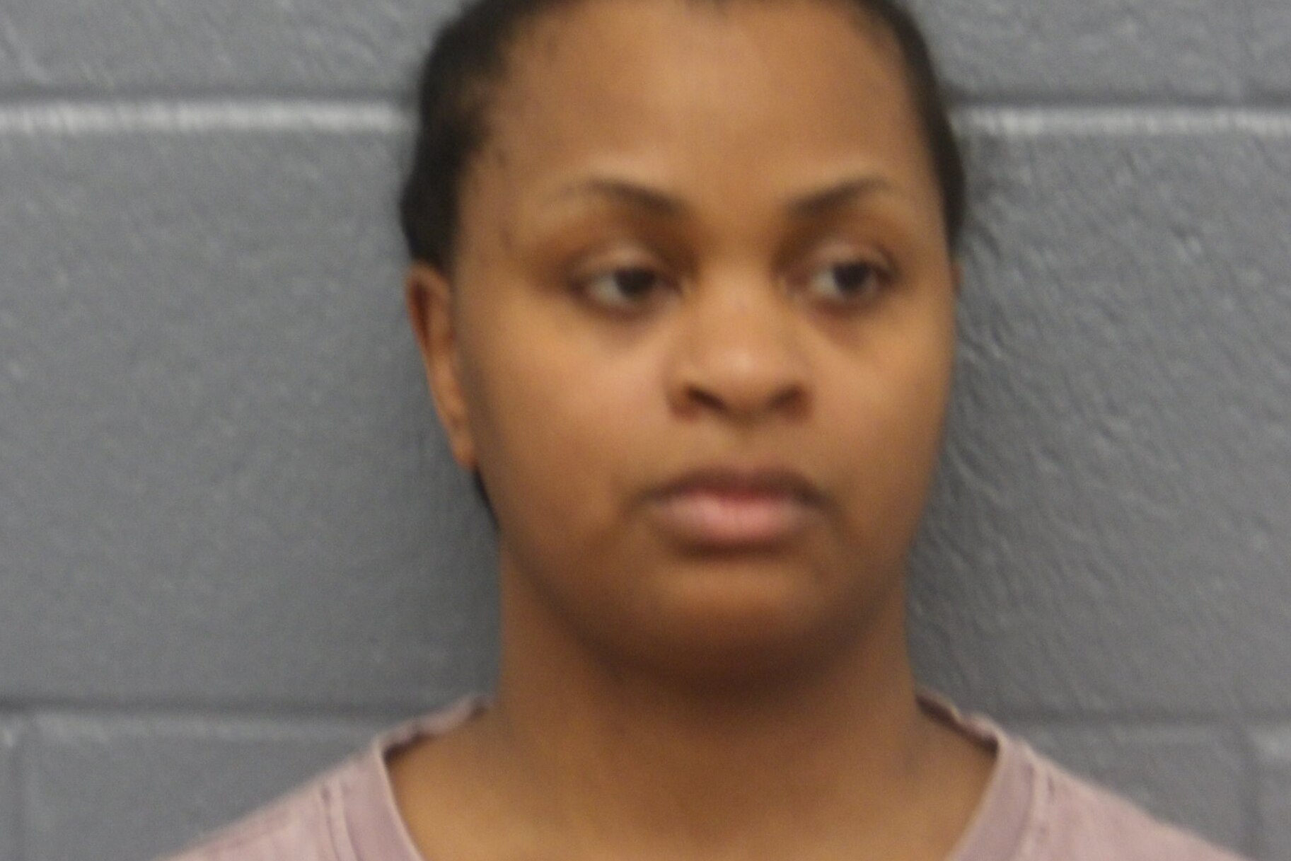 Mother arrested after bodies of 2 daughters found stuffed inside suitcases