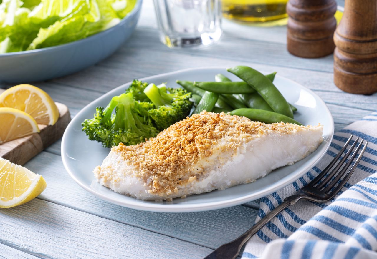Delicious oven baked fish with a crumbled cracker crust.