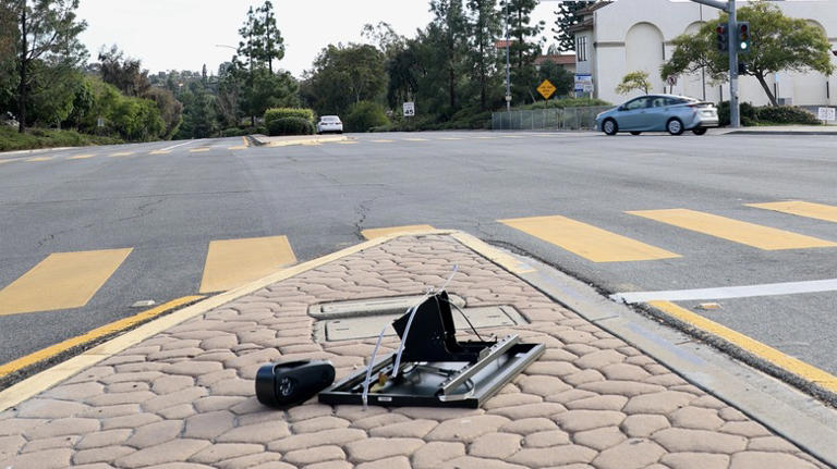 People across the US are tearing down Flock's traffic cameras - here's why