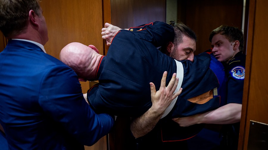 Ex-Marine forcibly removed from hearing vows to continue Senate campaign