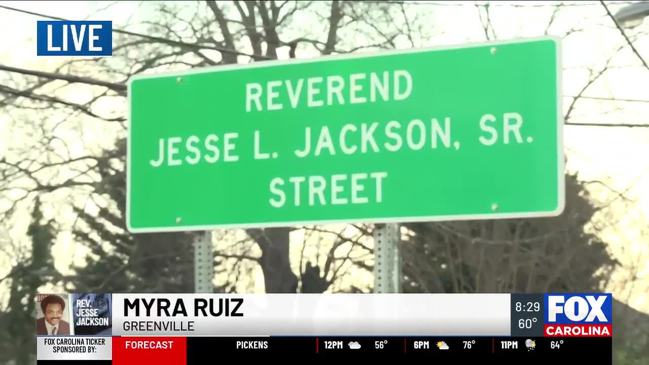 Memorial ceremony held by sign dedicating Greenville street to Rev ...
