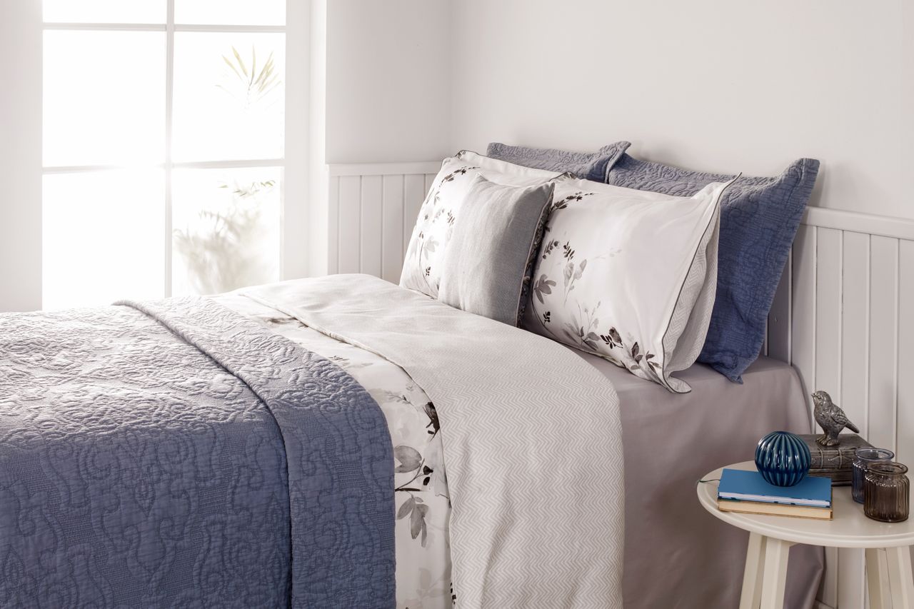 bed with quilt