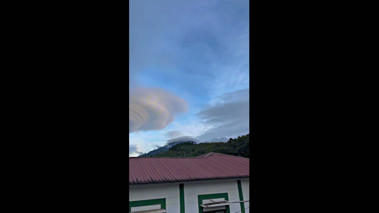 Rare lenticular cloud formation seen over sky in Tegal, Indonesia