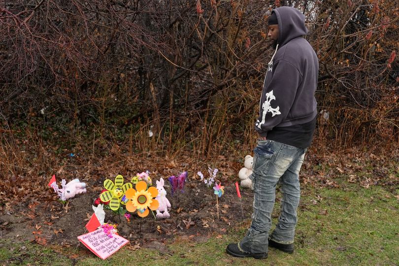 Woman arrested after the body of two young girls were found stuffed in ...