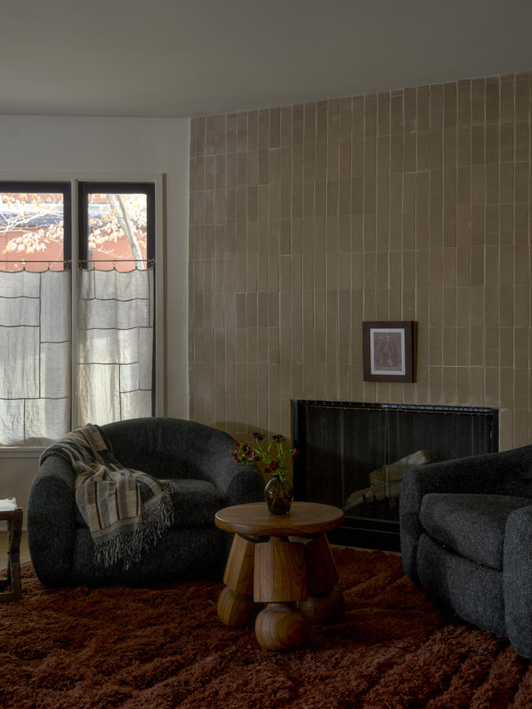 This 1970s circular home is moody luxury meets grandma’s cabin
