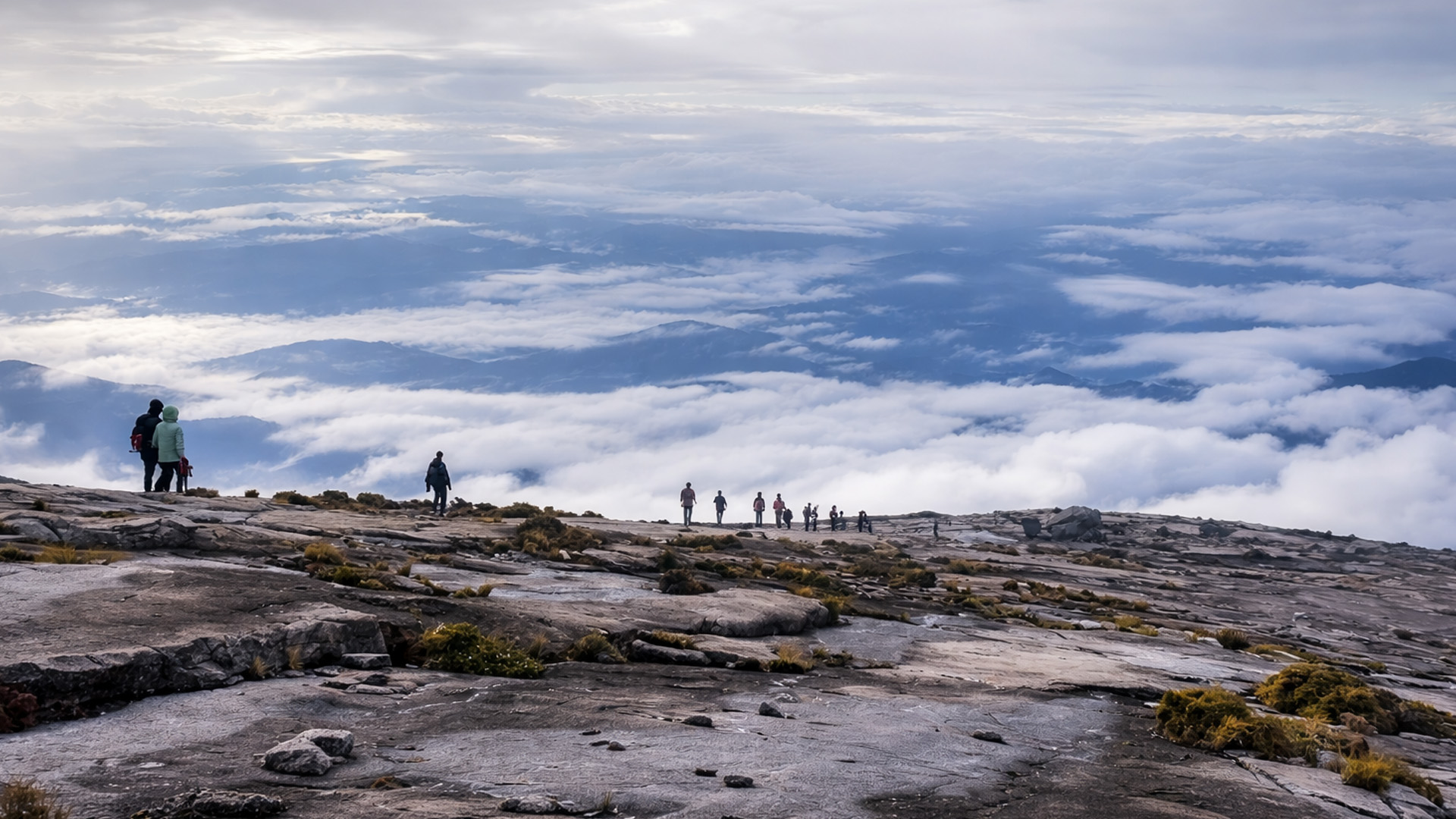 Why do climbers risk this rugged peak?