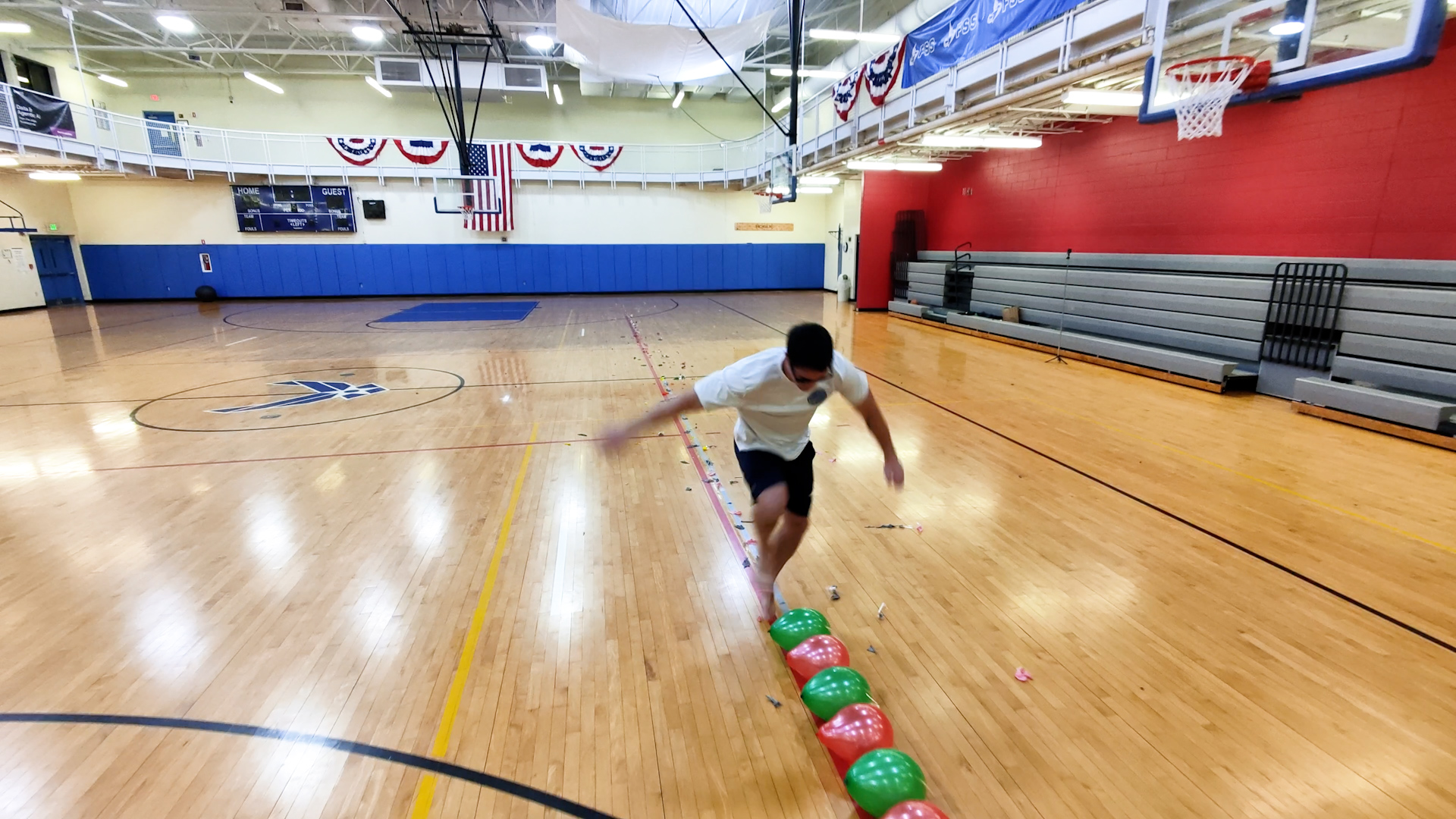 Fastest time to pop 100 balloons with the feet 19.78 seconds by Johnny ...