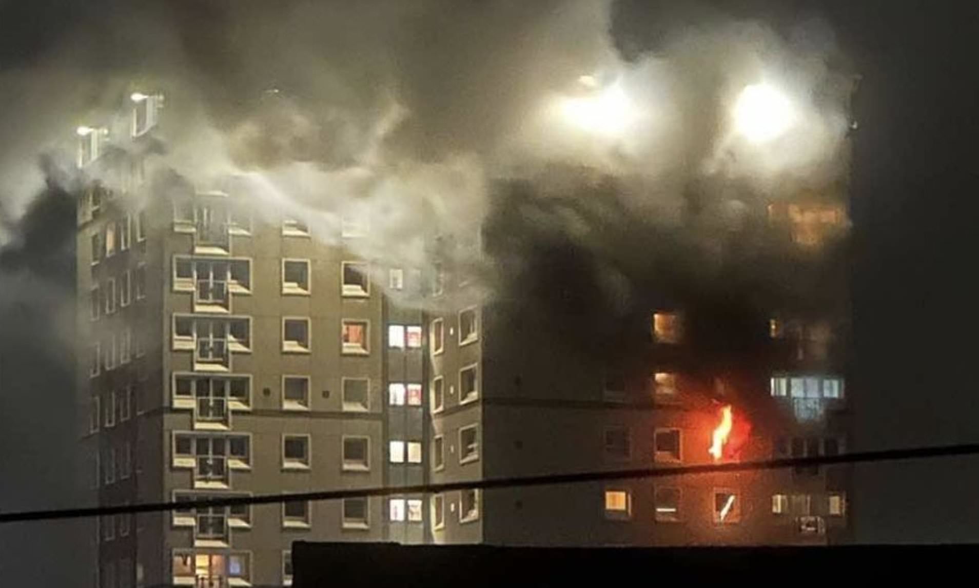 Man dies falling from window during tower block fire
