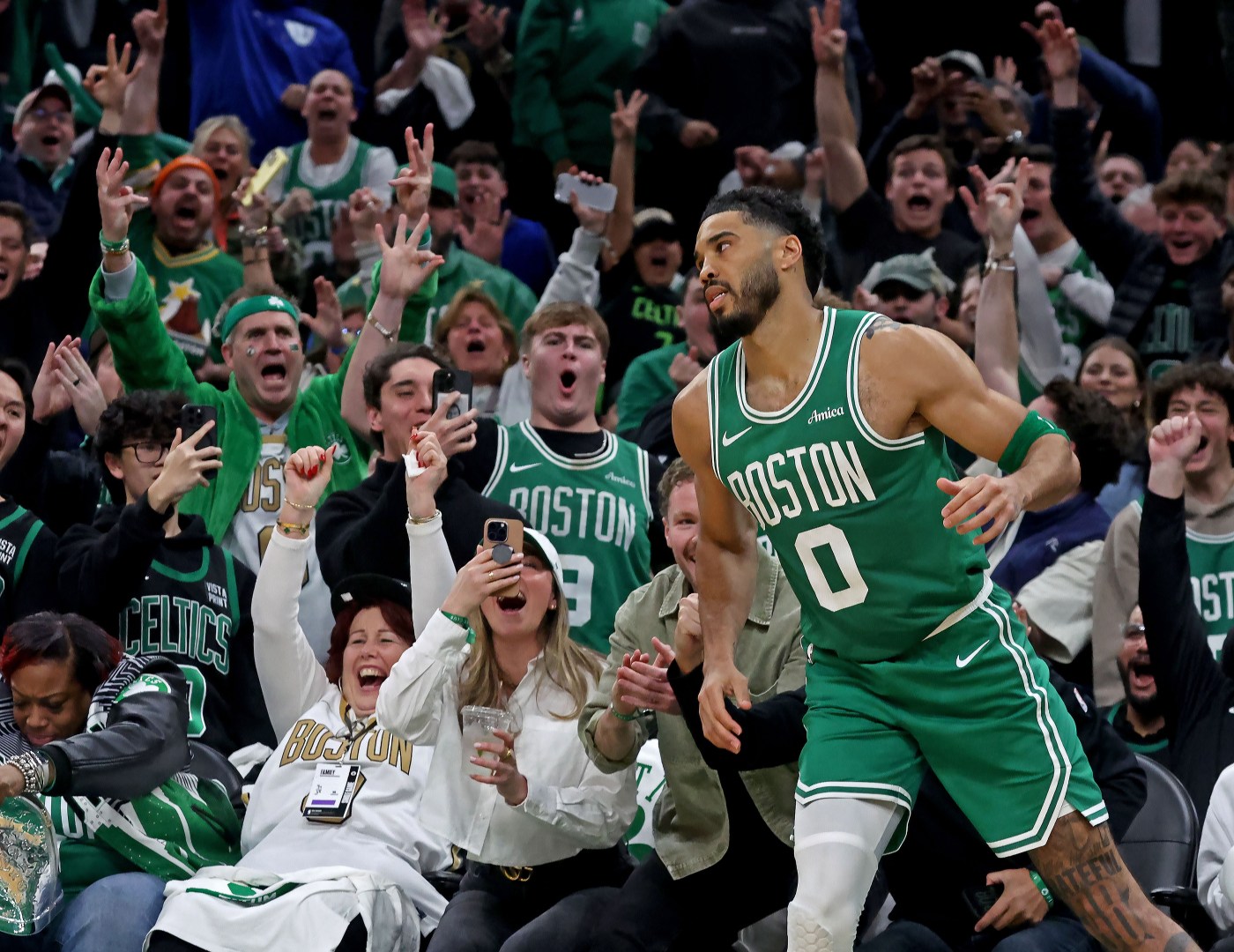 Jayson Tatum notches double-double in season debut as Celtics beat Mavs
