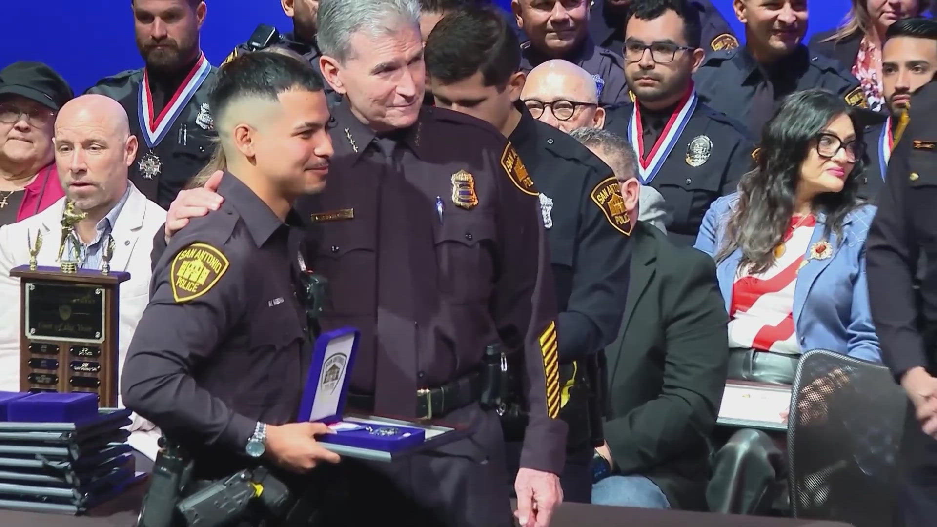 SAPD officer honored for rescue of wounded officer during police ambush ...