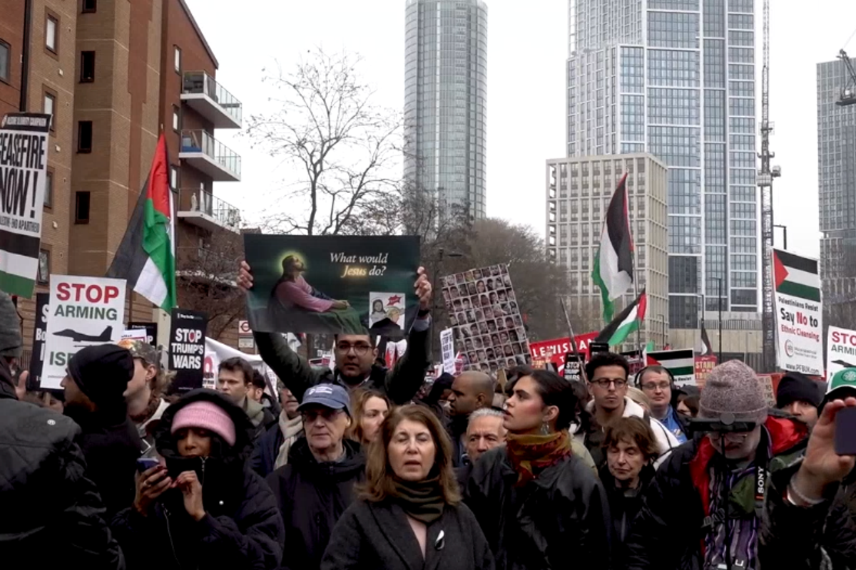 Protesters rally outside US embassy calling to end attacks on Iran