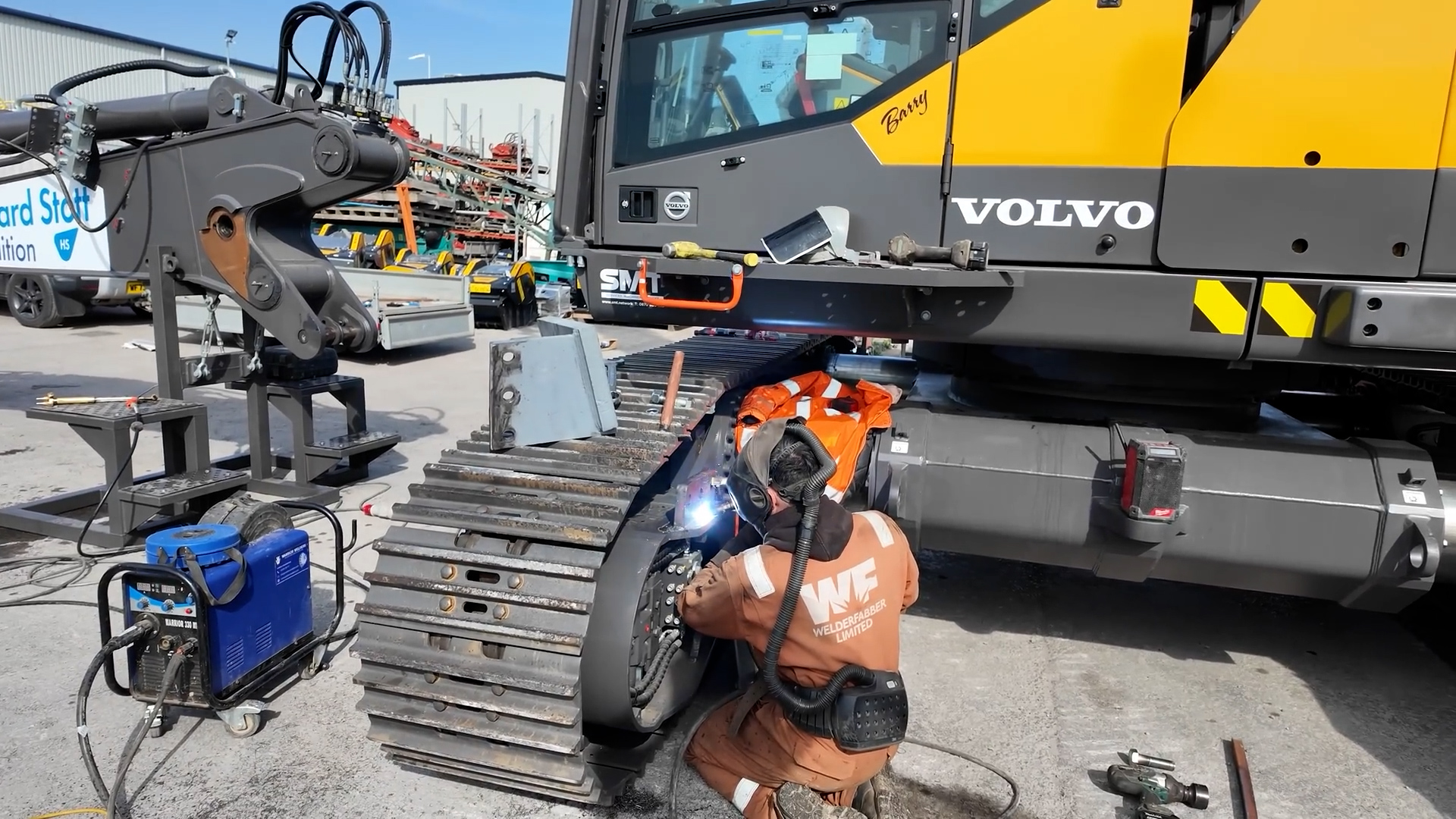 Heavy equipment undercarriage repair in progress