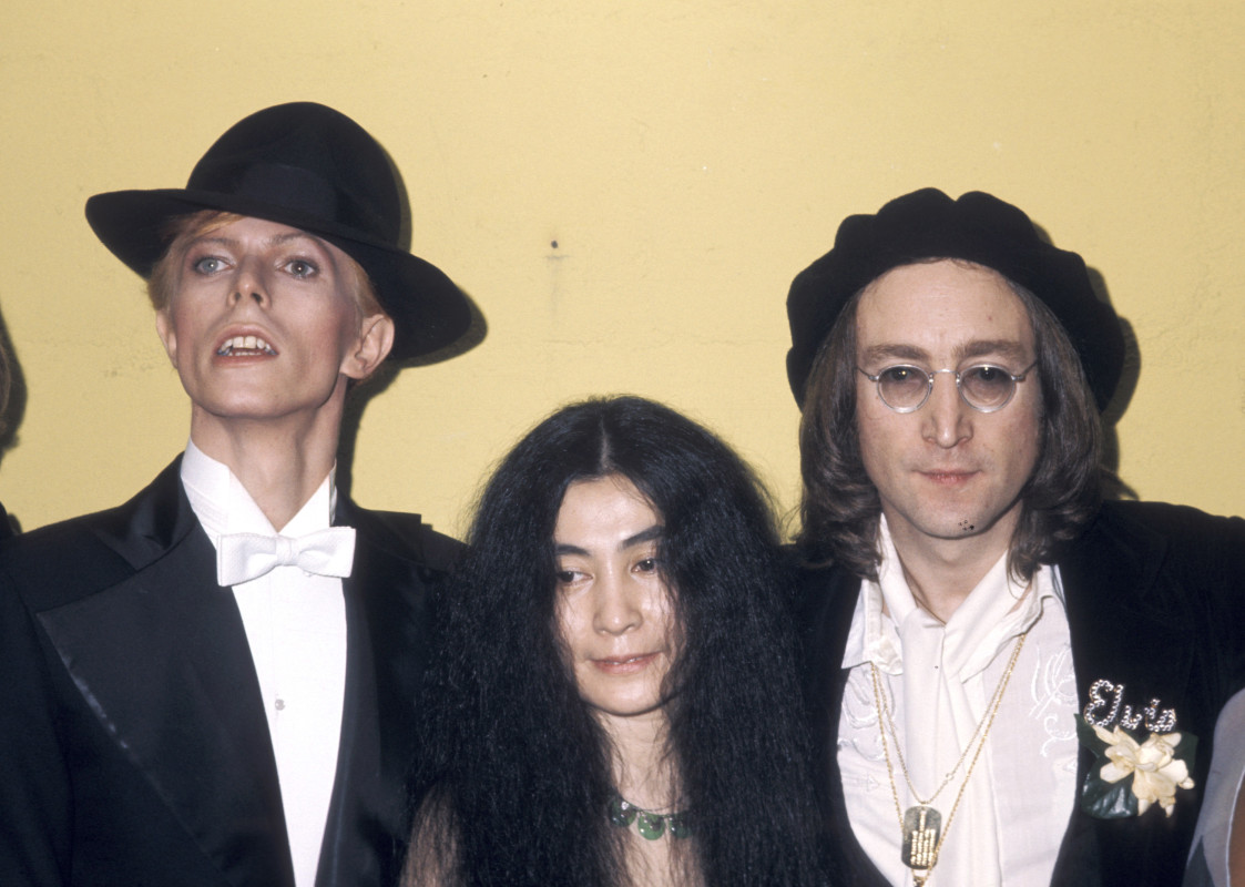 John Lennon, Yoko Ono, and David Bowie posed togther at the 1975 Grammys, the same year "Fame" was released. Photo by Ron Galella/Ron Galella Collection via Getty Images