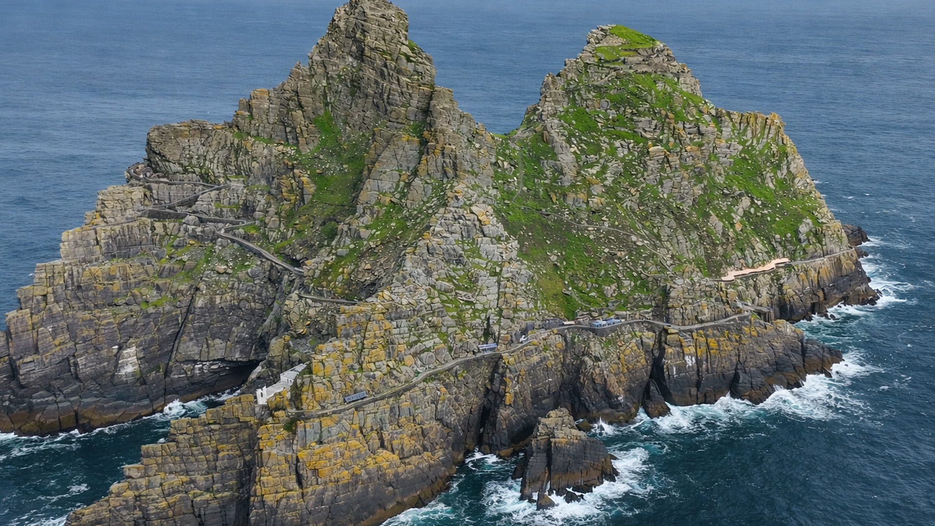 Why were monks drawn to this isolated rock?