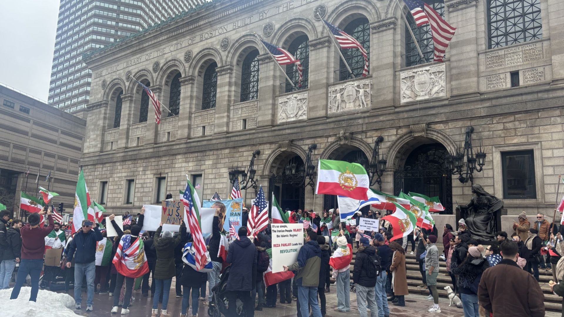 Dozens rally over US action in Iran in Massachusetts