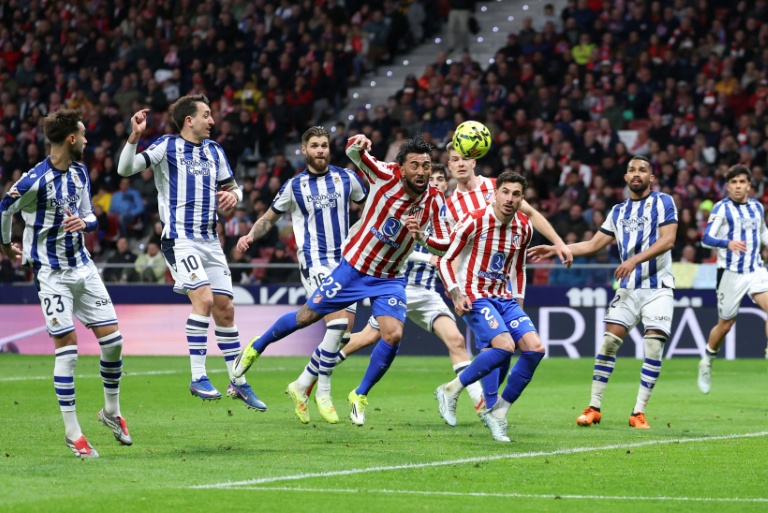 Atletico Madrid's Argentine midfielder Nico Gonzalez netted twice as they edged Real Sociedad in a five-goal thriller