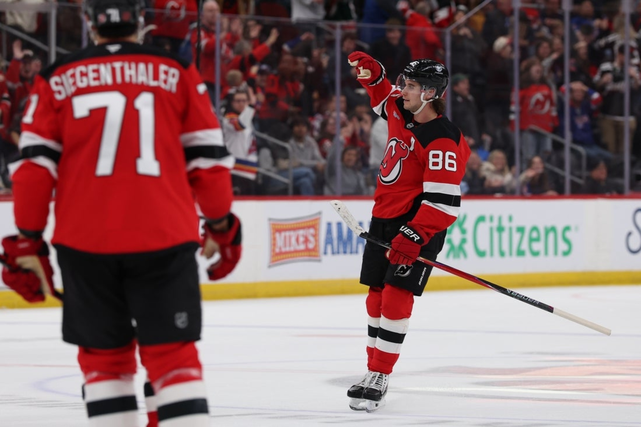 Jack Hughes' hat trick helps Devils double up Rangers