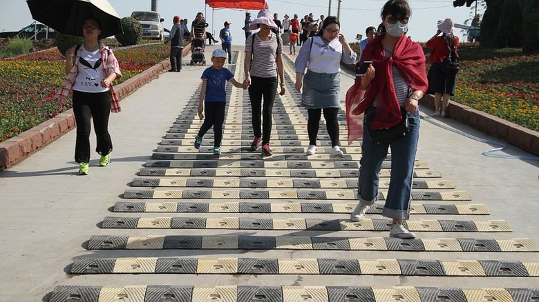 Speed bumps placed on a pathway in the ancient town of Taierzhuang along the Beijing-Hangzhou Grand Canal in 2017.