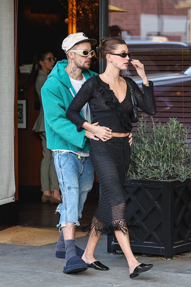 Hailey and Justin Bieber are polar opposites in two types of slippers