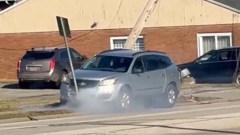 Car gets stuck after hitting pole on South Avenue