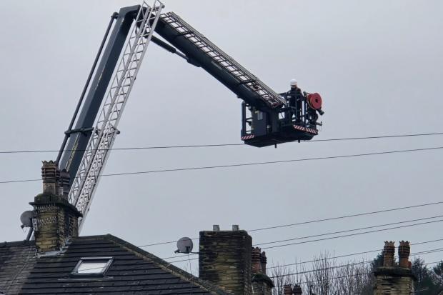 Police reveal man was arrested after fire destroyed roofs of houses in ...